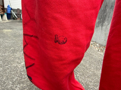 Red sweatpants